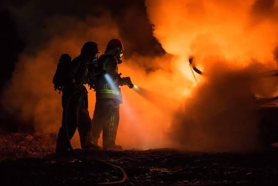 Firefighters working at a fire